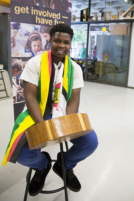Ngoni Mugwisi played an instrument from his native country of Zimbabwe for visitors at the Fulton Schools’ Homecoming Block Party. Photographer: Jessica Hochreiter/ASU 