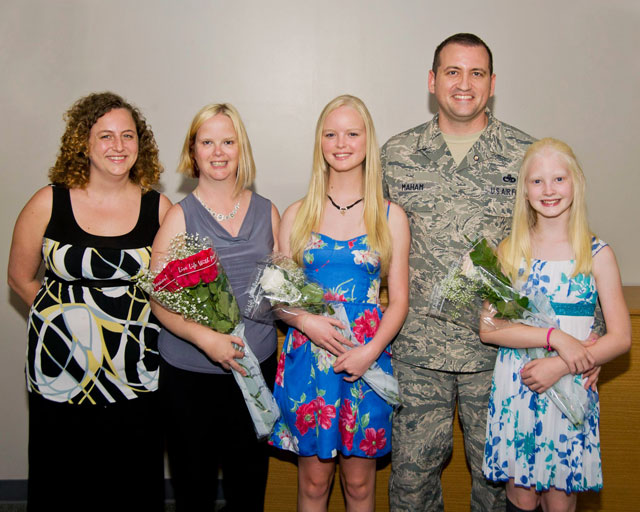 Kristopher Maham with his family at his retirement ceremony in May 2014. He served in the U.S. Air Force for nearly 18 years. From left to right: Family friend Tiffany Sapp, his wife Melanie Maham, his daughter Kristina, Kristopher Maham and his daughter Lindsey. Photo courtesy of Kristopher Maham.