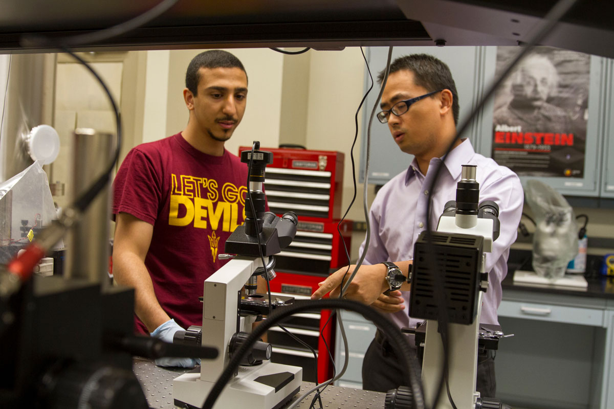 Liping Wang looks over metamaterials created in his Nano-Engineered Thermal Radiation Group.