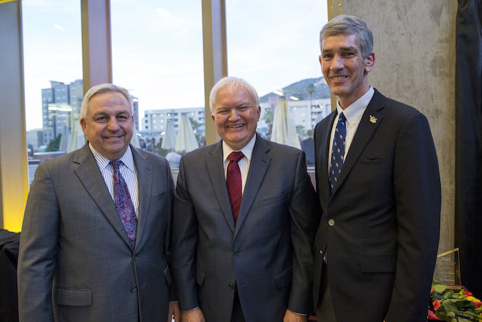 Photo of three men standing next to one another with a caption of "School Director G. Edward Gibson (center) pictured with Hall of Fame inductees Eric Hedlund (left) and Paul Johnson (right). Photographer: Jessica Hochreiter/ASU"