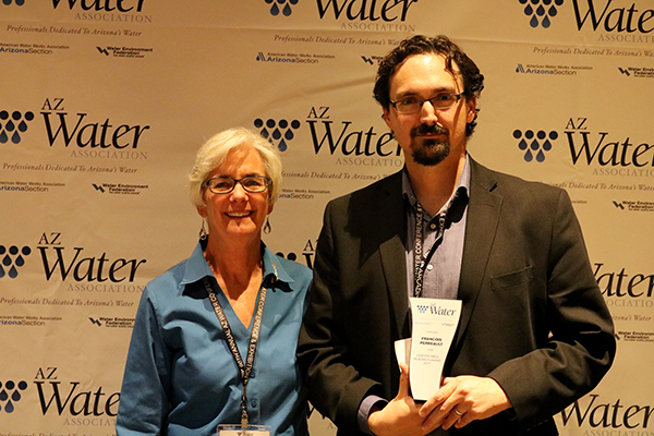 Photo of Francois Perreault holding the award next to Marie Pearthree with a caption of Assistant Professor Francois Perreault receives the Quentin Mees Research Award which recognizes outstanding contributions to water environmental research from Marie Pearthree, president of the AZ Water Association. Photographer: Robert A. Goff/AZ Water Association 