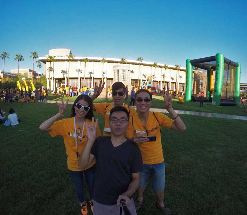 Photo of four of the Vietnamese scholars on Arizona State University's Hayden Lawn during the Fall Welcome event in August.