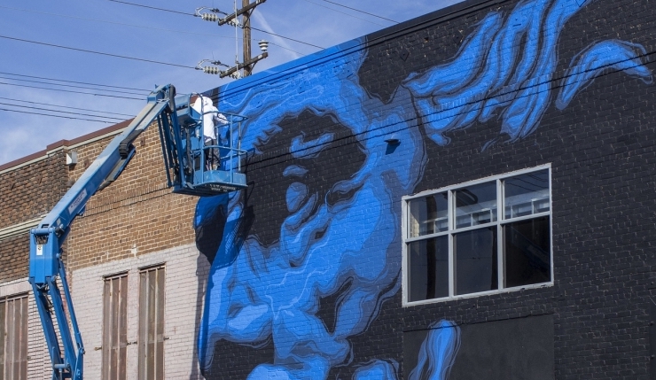 Street Art Meets Climate Science in the Big, Blue Face of Zeus