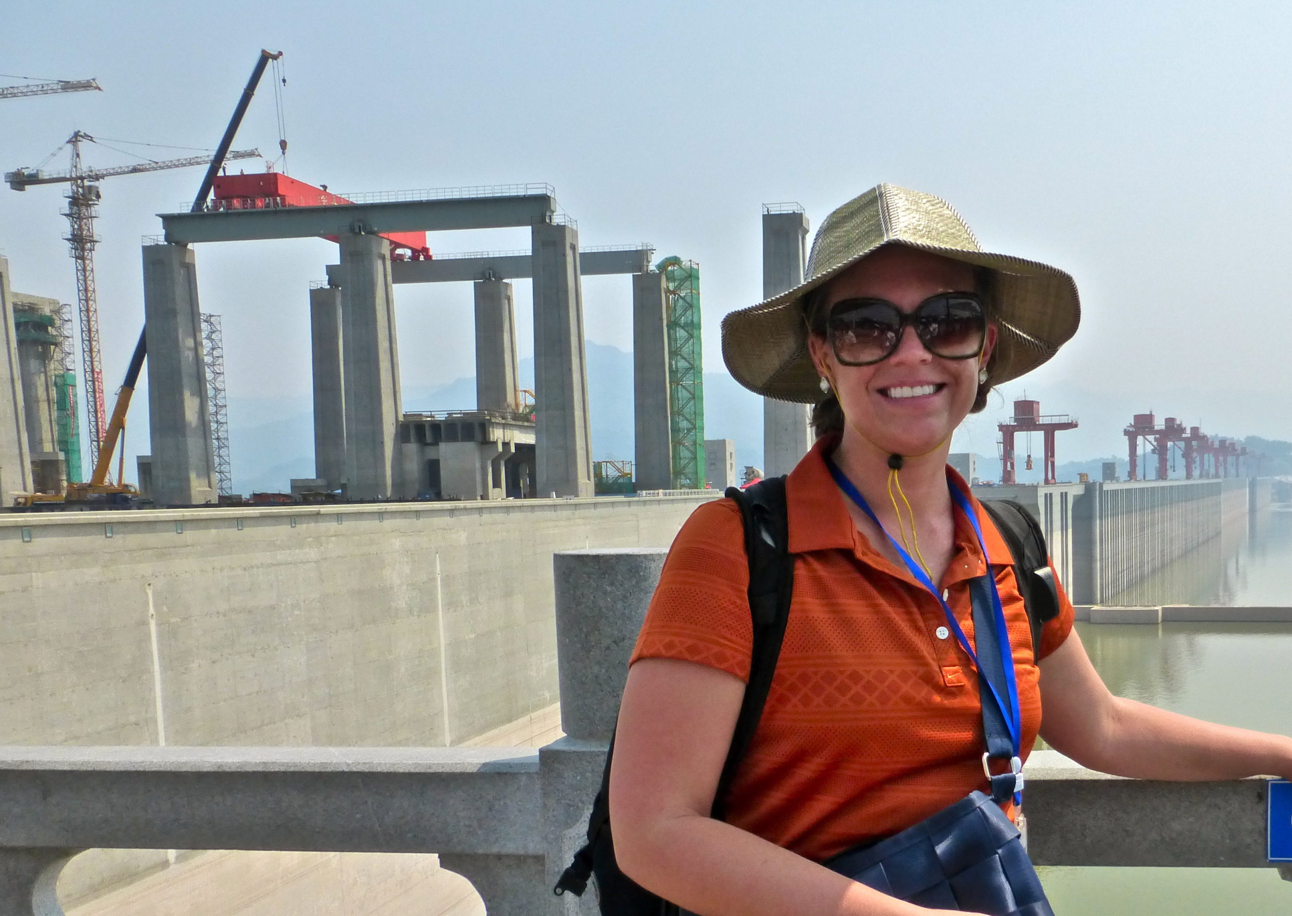 woman posing in front of construction