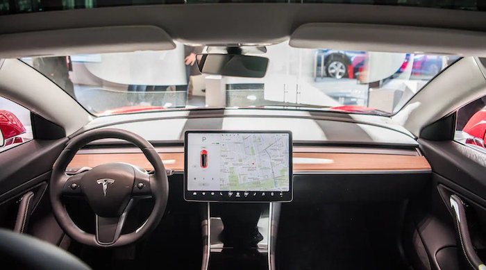 Tesla is putting ‘self-driving’ in the hands of drivers amid criticism the tech is not ready