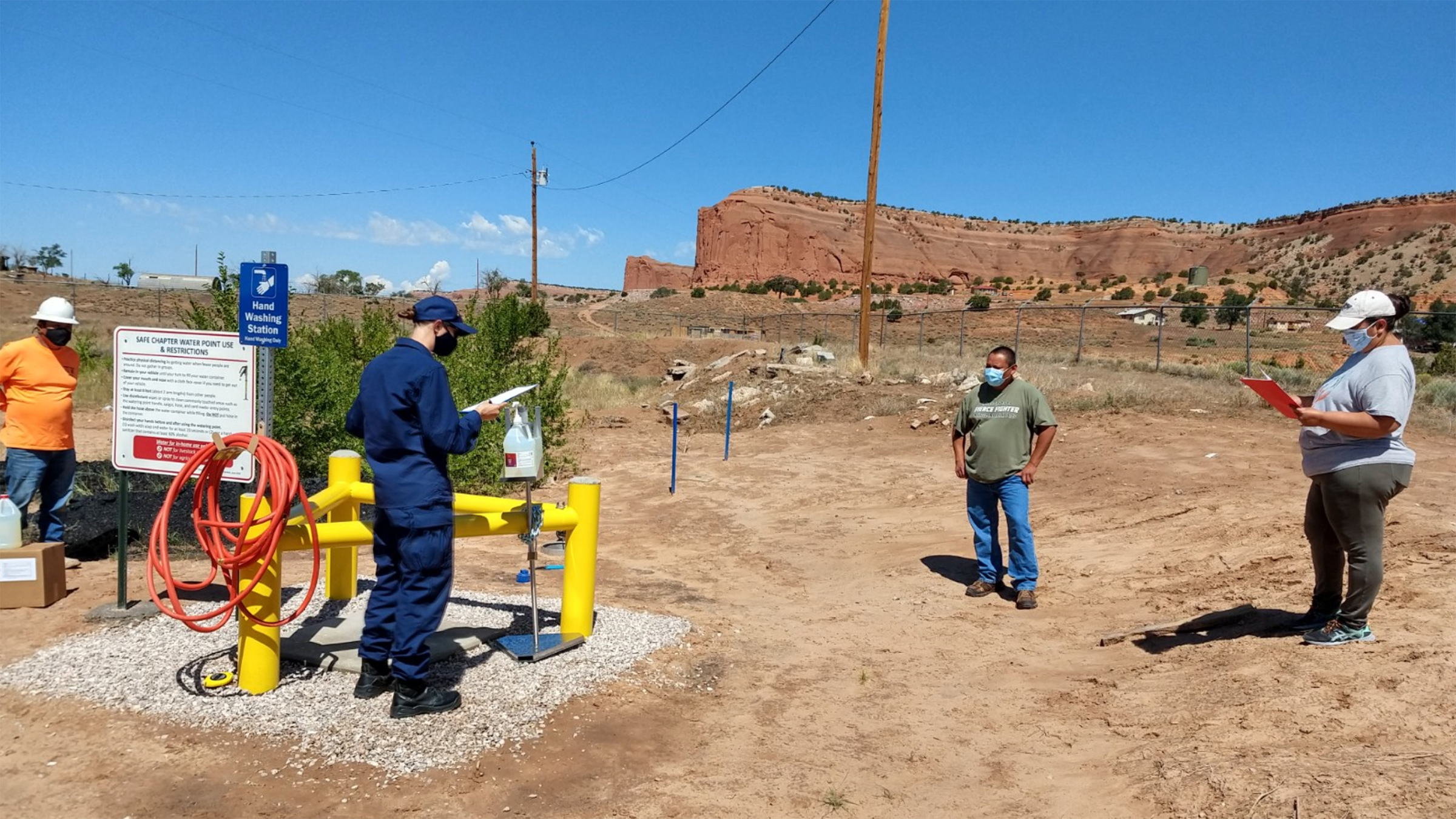 Members of the Navajo Nation COVID-19 Water Access Coordination Group working outdoors