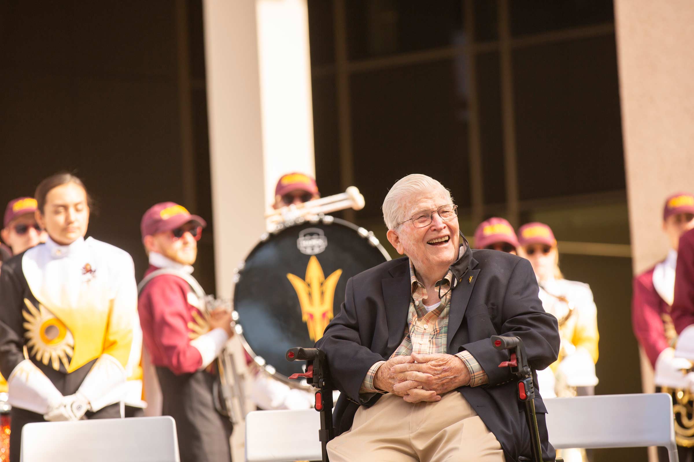 Ira Fulton sitting during a 90th birthday celebration