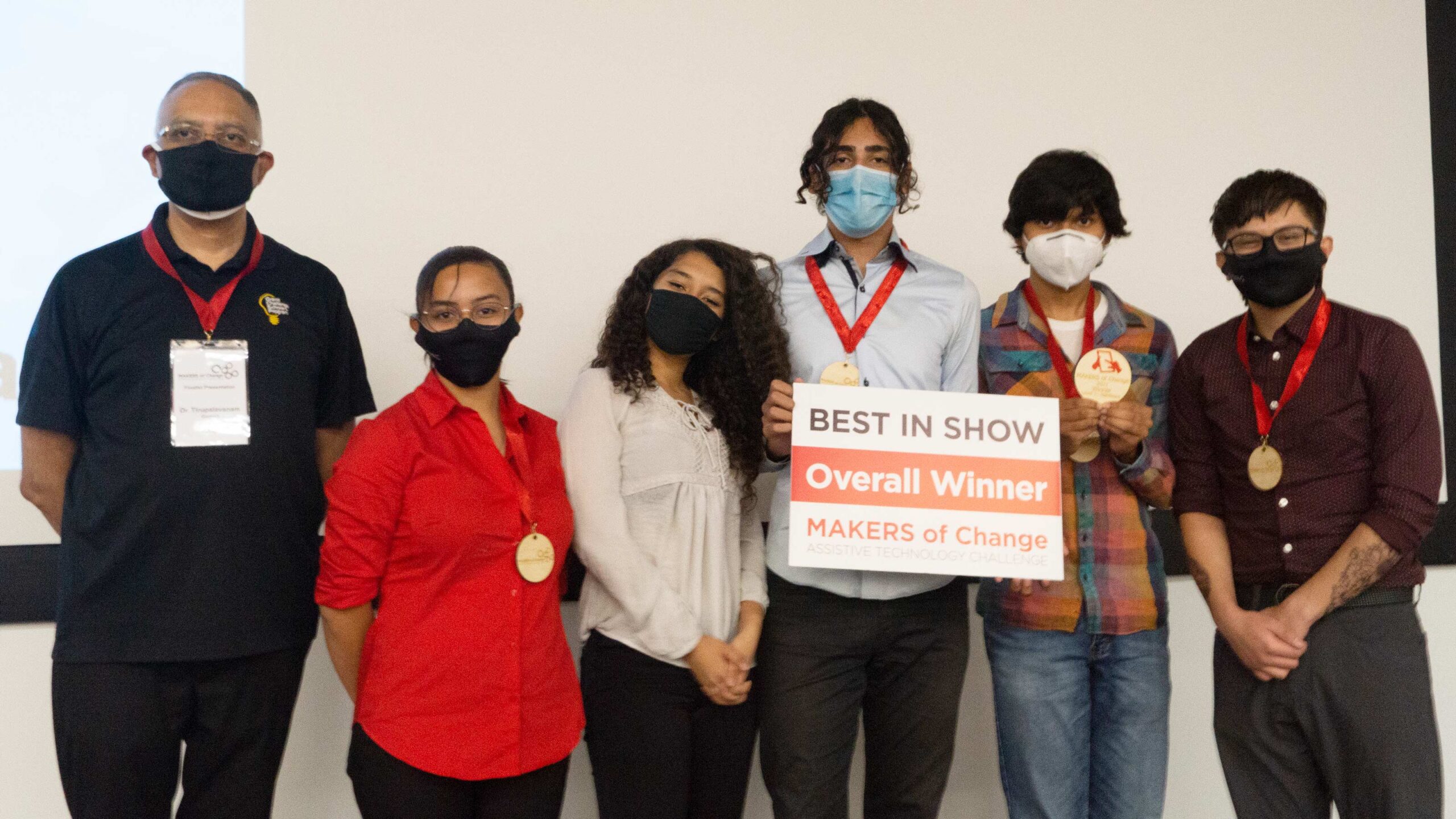 Five EPICS High students with a sign that says "Best in Show"