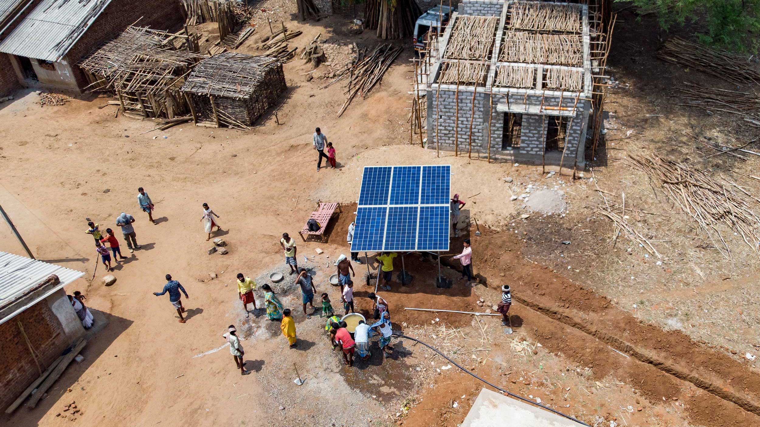 a remote village with solar panels