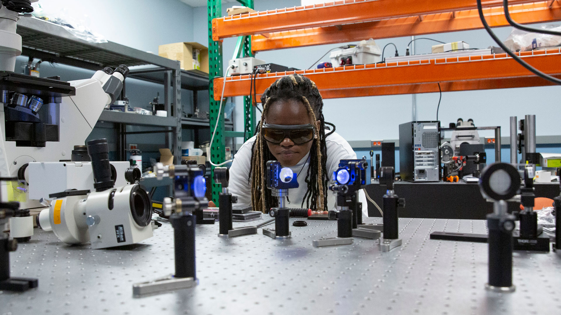 Materials science and engineering graduate student Christabel Wireko Arthur conducts nanoparticle research for health care applications.
