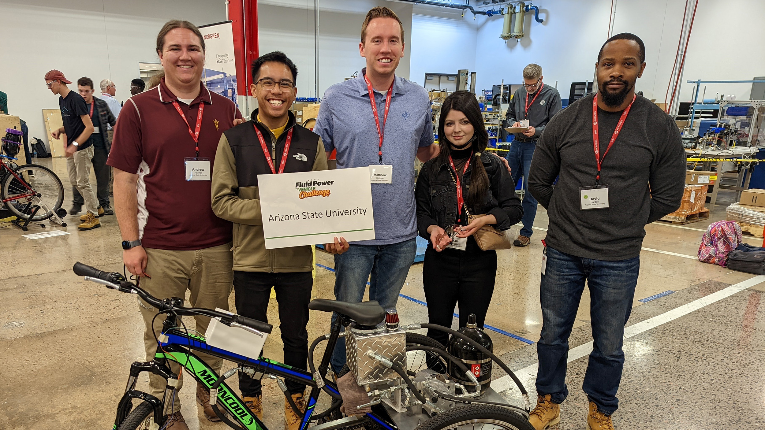 A group photo of the ASU Power Vehicle Challenge team at the 2021-2022 Fluid Power Vehicle Challenge organized by the National Fluid Power Association in Littleton, Colorado.
