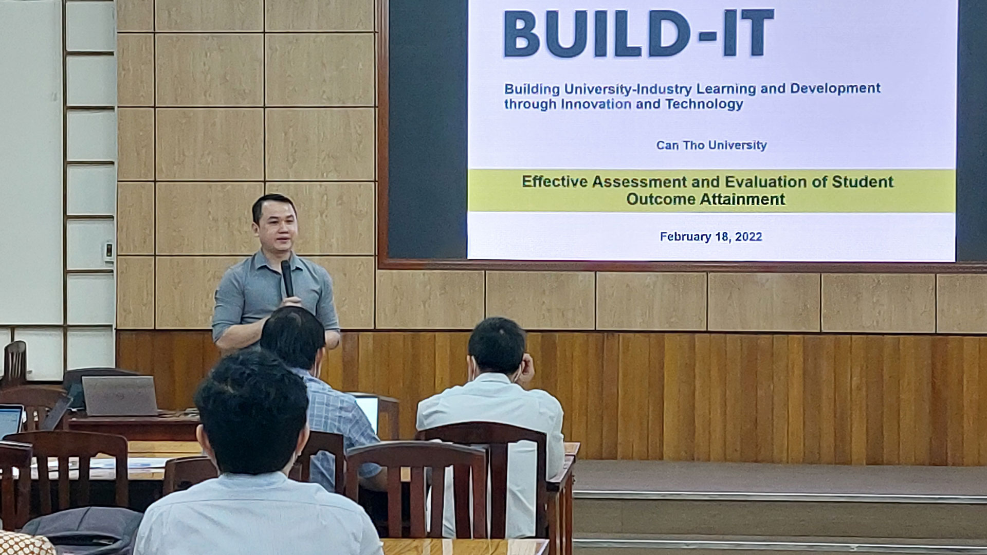 Thai Tran, a program manager for accreditation and quality assurance, presents a workshop on ABET accreditation topics at Can Tho University in Vietnam.