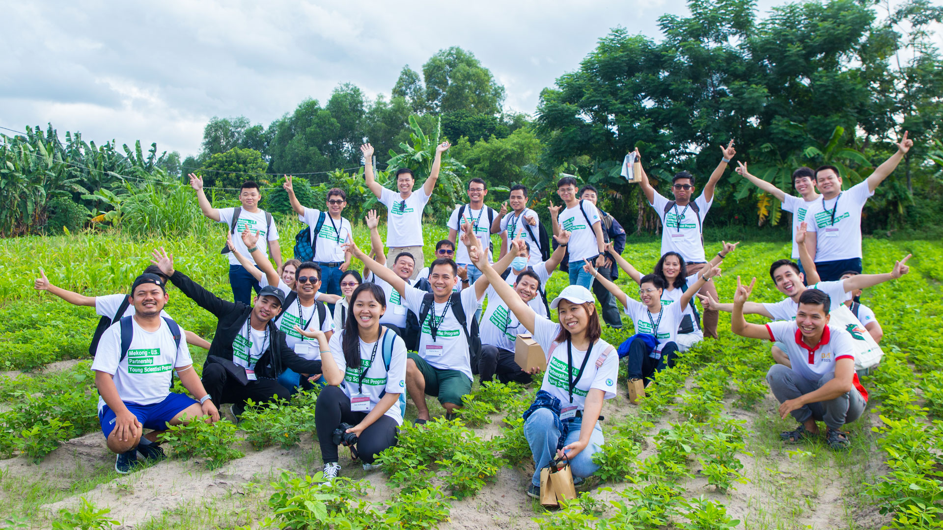 The Mekong-U.S. Partnership Young Scientist Program participants pose in an agricultural field in Vietnam.