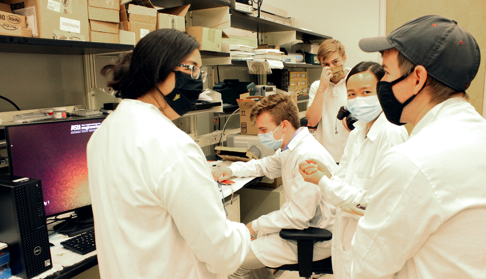 Jennifer Blain Christen and students in a lab