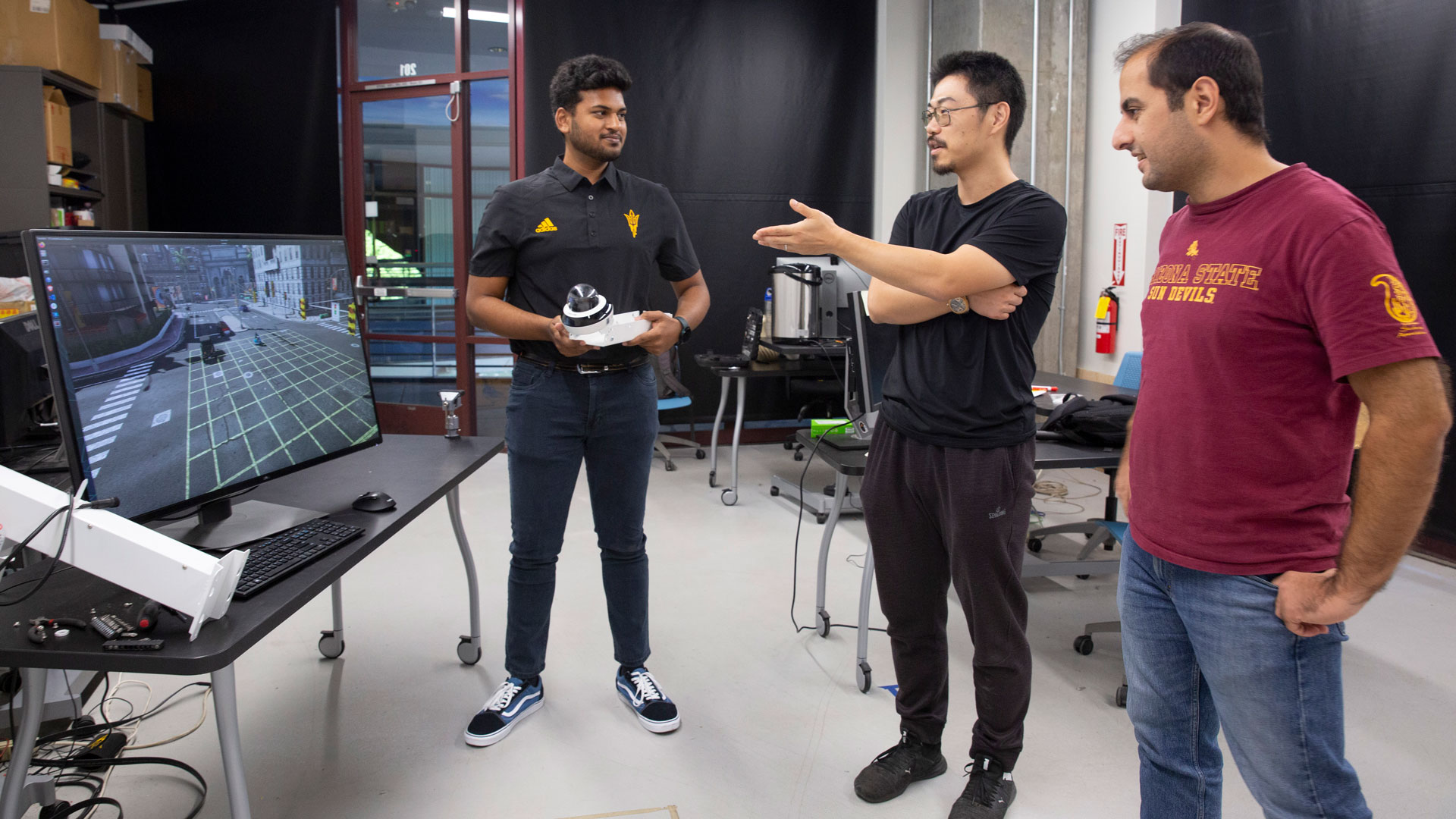 Robotics and autonomous systems graduate student Manthan Chelenahalli Satish is using traffic cameras and computer vision to estimate vehicle speed with Associate Professor Yezhou Yang and Mohammad Farhadi as part of MORE research in the Ira A. Fulton Schools of Engineering at ASU.