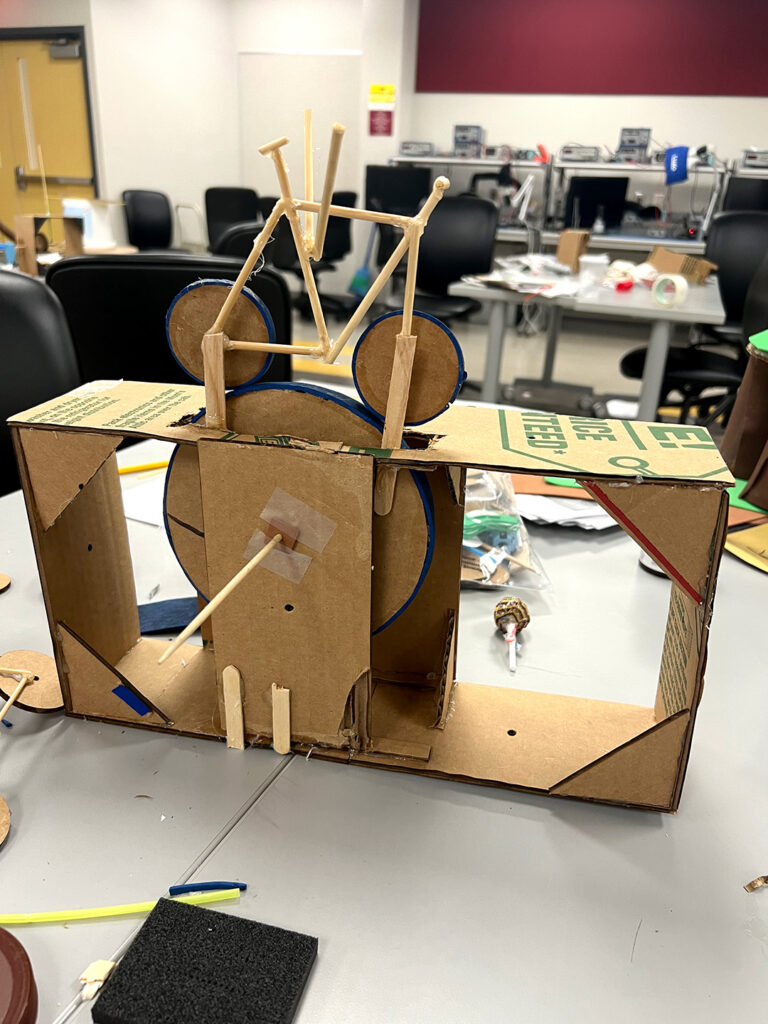 A student prototype for a flying steampunk bicycle automata.