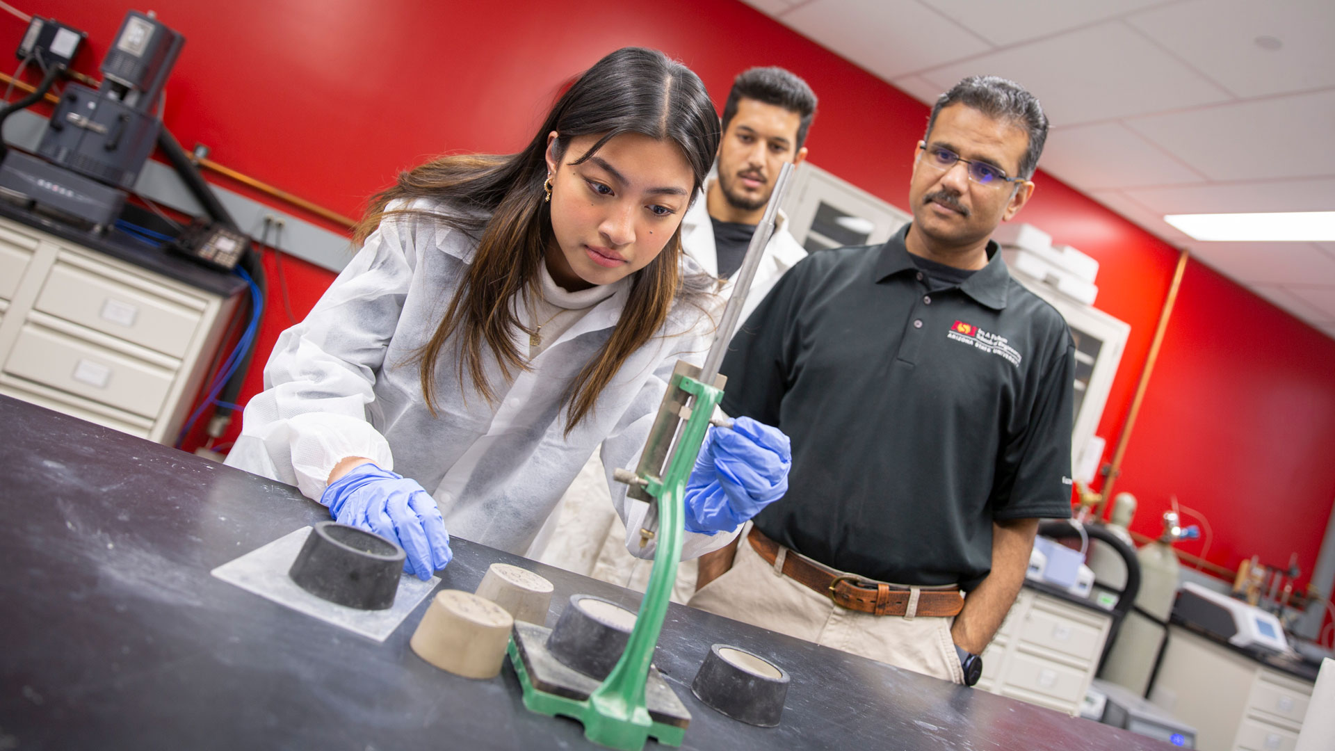 ASU civil engineering student Lana Banzon works with Professor Narayanan Neithalath and a graduate student in the lab as part of a FURI research project.