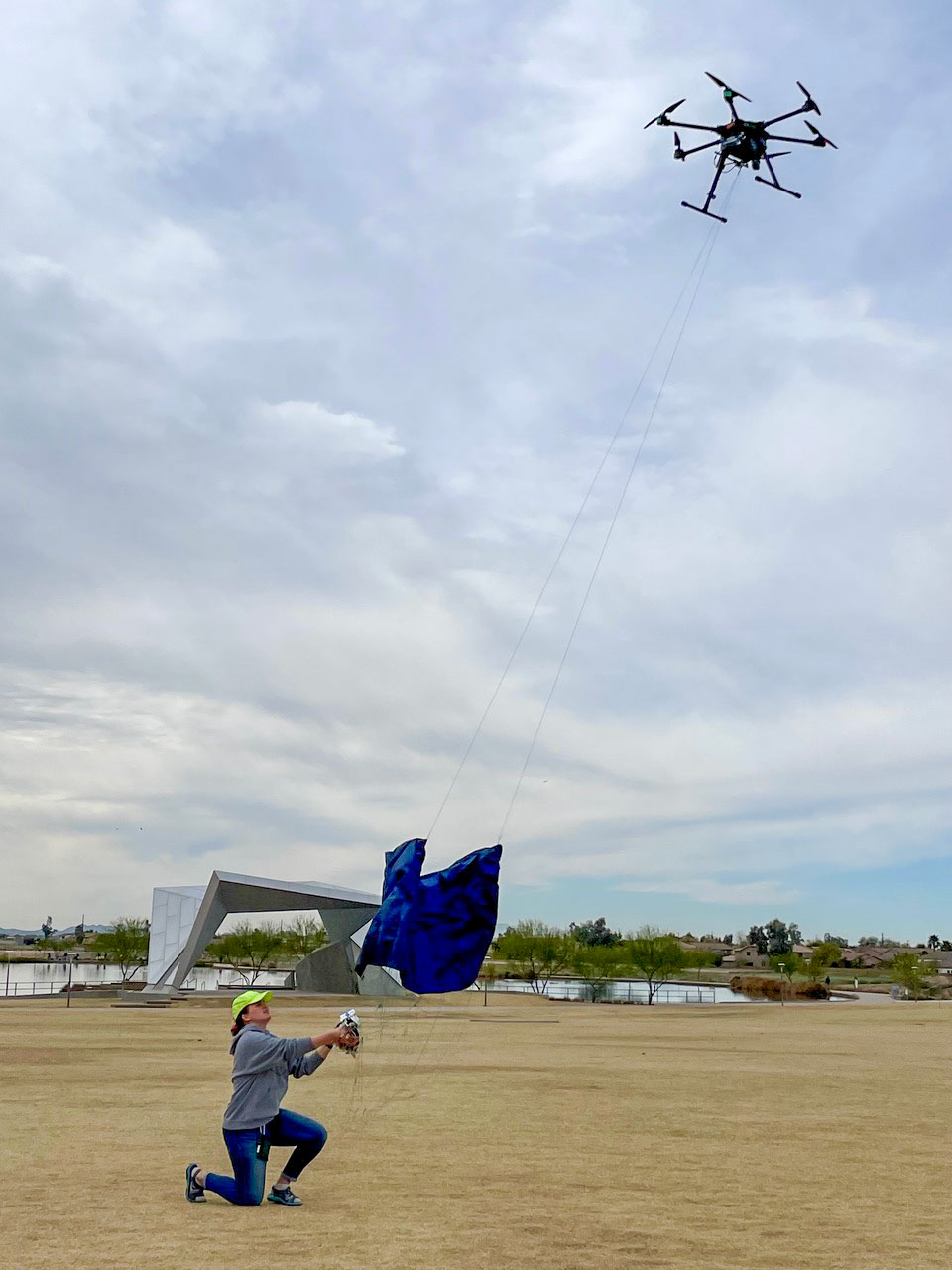 student testing a an autonomously guided parachute delivery system