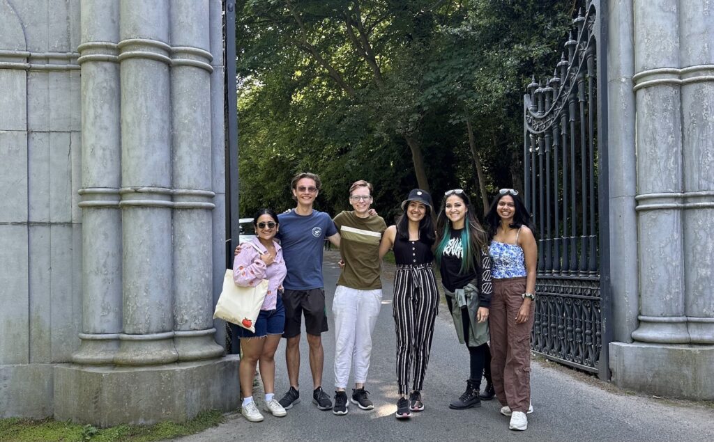 six students outside the gates of an Irish castle