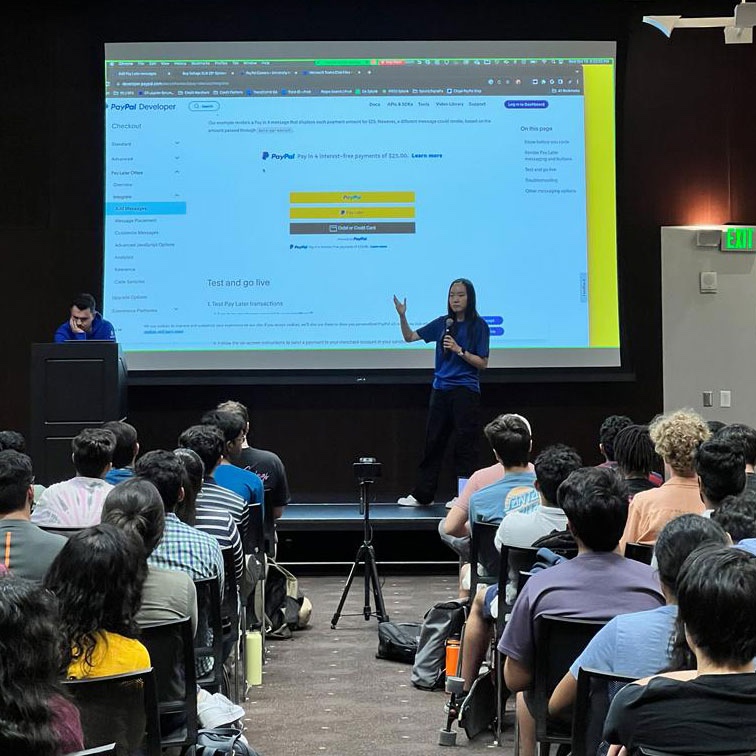 Courtney Ngai speaks to a group of students from the Google Developer Student Club 