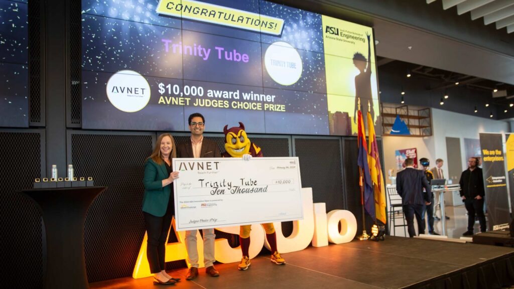 Katie Stringham and Sparky present the $10,000 Avnet Judges’ Choice prize to Trinity Tube