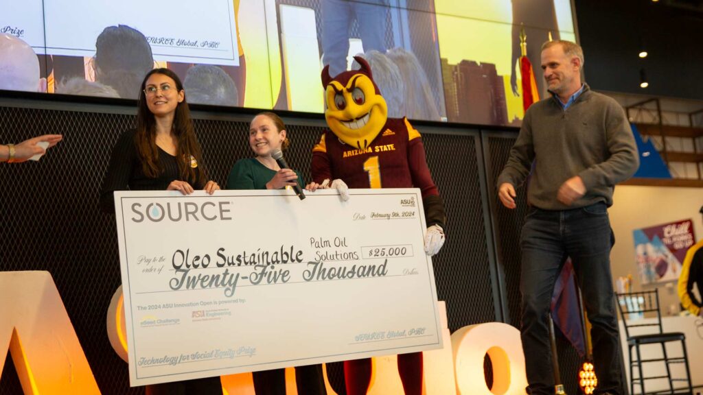 Gabriella Dweck and Kelly Redmond accept the $25,000 SOURCE Technology for Social Equity Prize