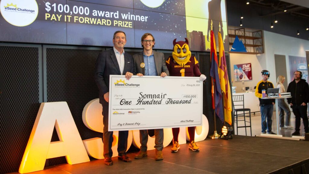 Tom Prescott and Sparky present the $100,000 eSeed Pay it Forward Prize Somnair