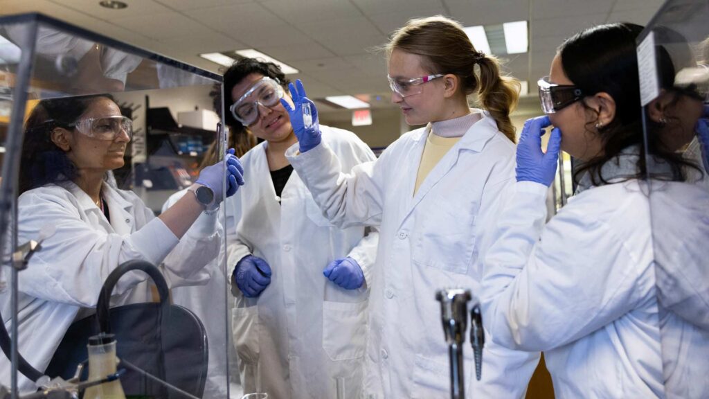Four students in a lab