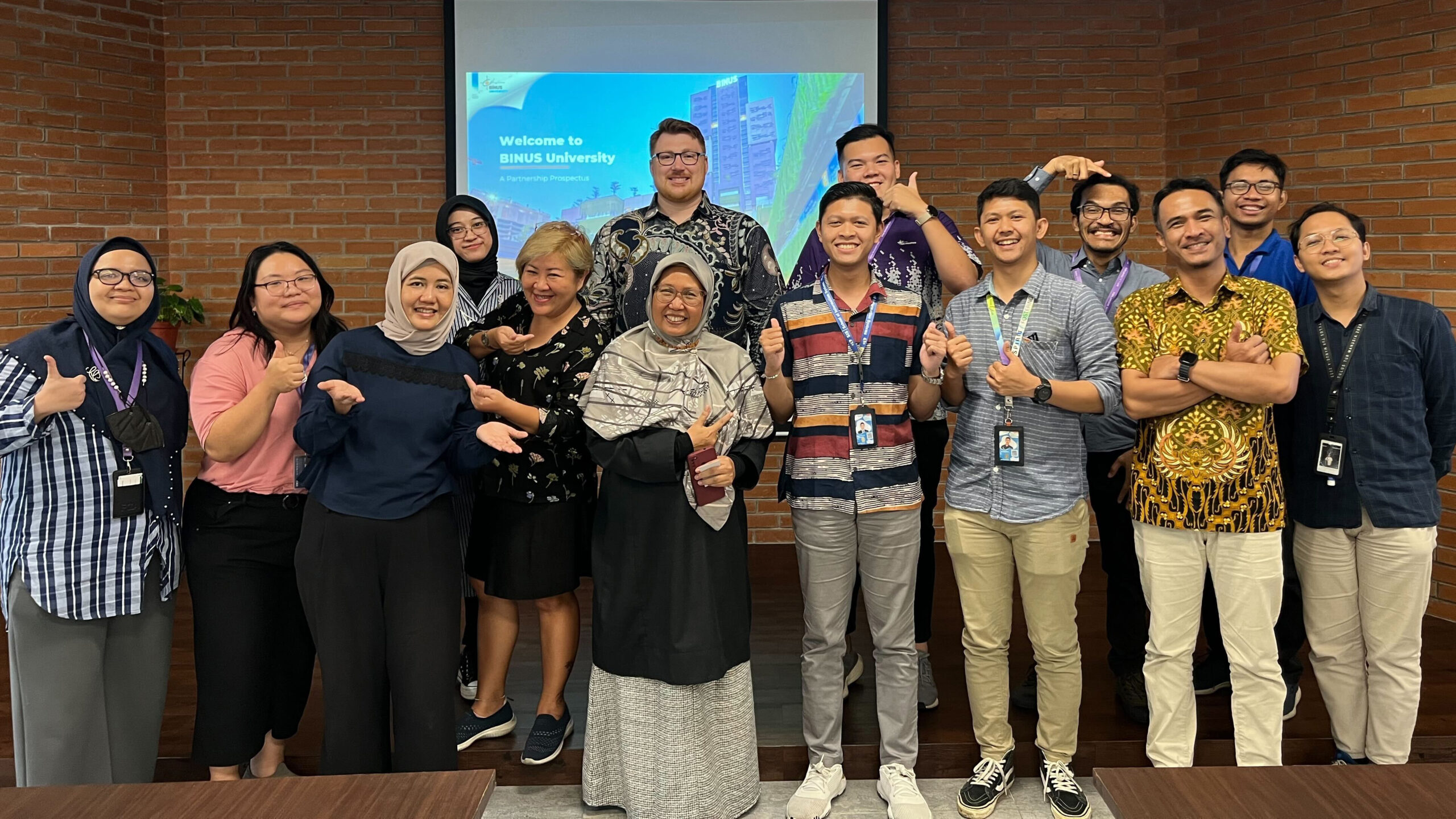 A group photo of ASU’s Jared Schoepf with representatives from Bina Nusantara University in Indonesia.