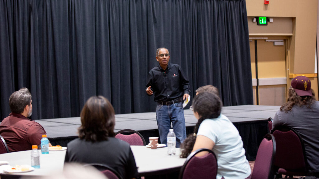 A Microchip industry representative talks to students participating in a microelectronics workshop held at ASU's West Valley campus.