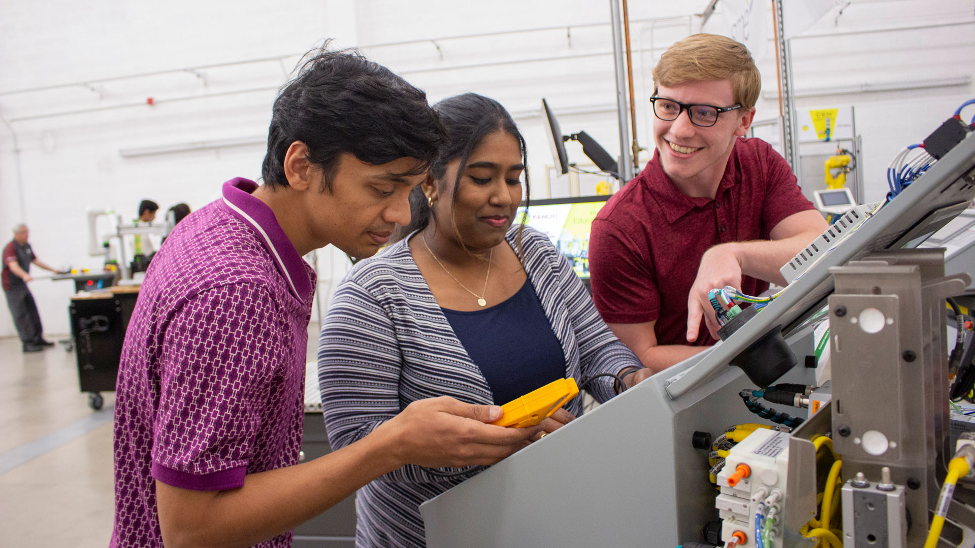 students in the Industrial Automation and Robotic Systems Laboratory