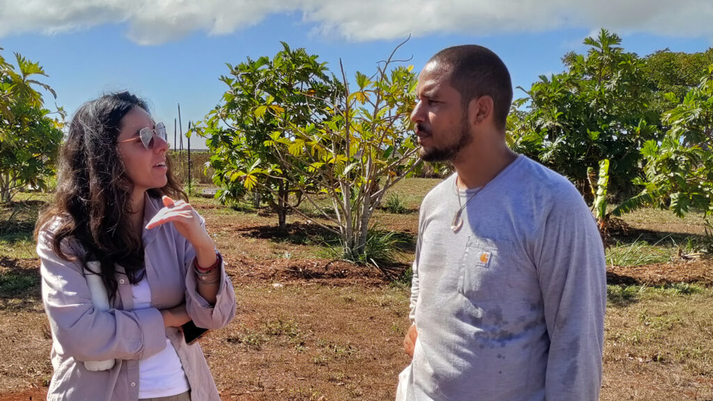 Ana Turano talking to farmer