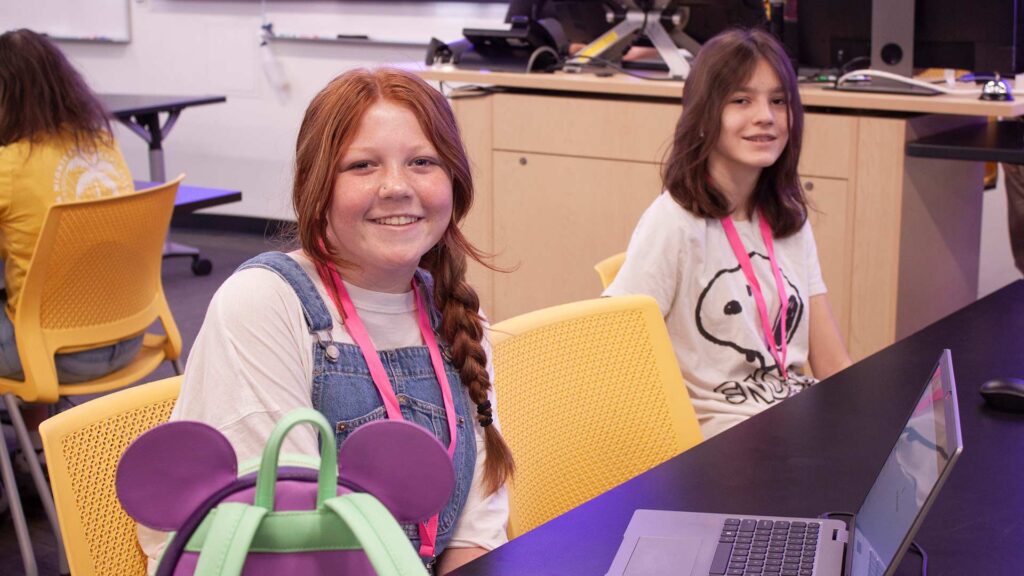 Two middle school students at the 2024 Desert CodeSprouts workshop.